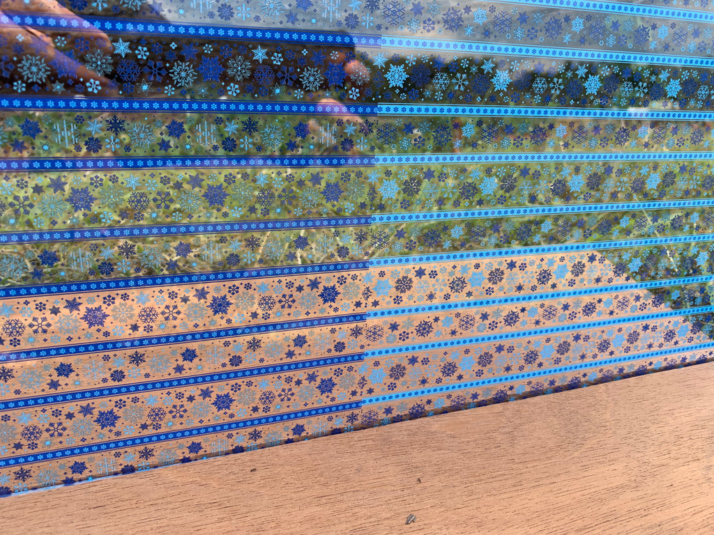 PatternPly® Scattered Blue Stripe Snowflake Duo sheet showing the pattern