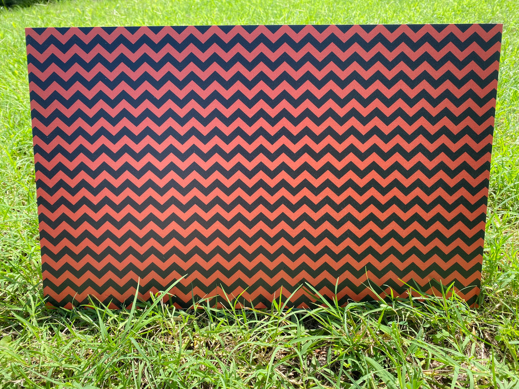 PatternPly® Full Coverage Orange and Black Chevron sheet showing the pattern