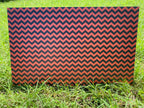 PatternPly® Full Coverage Orange and Black Chevron sheet showing the pattern