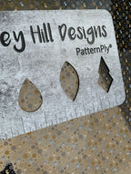 PatternPly® Scattered Silver and Gold Angels and Snowflakes sheet showing the pattern