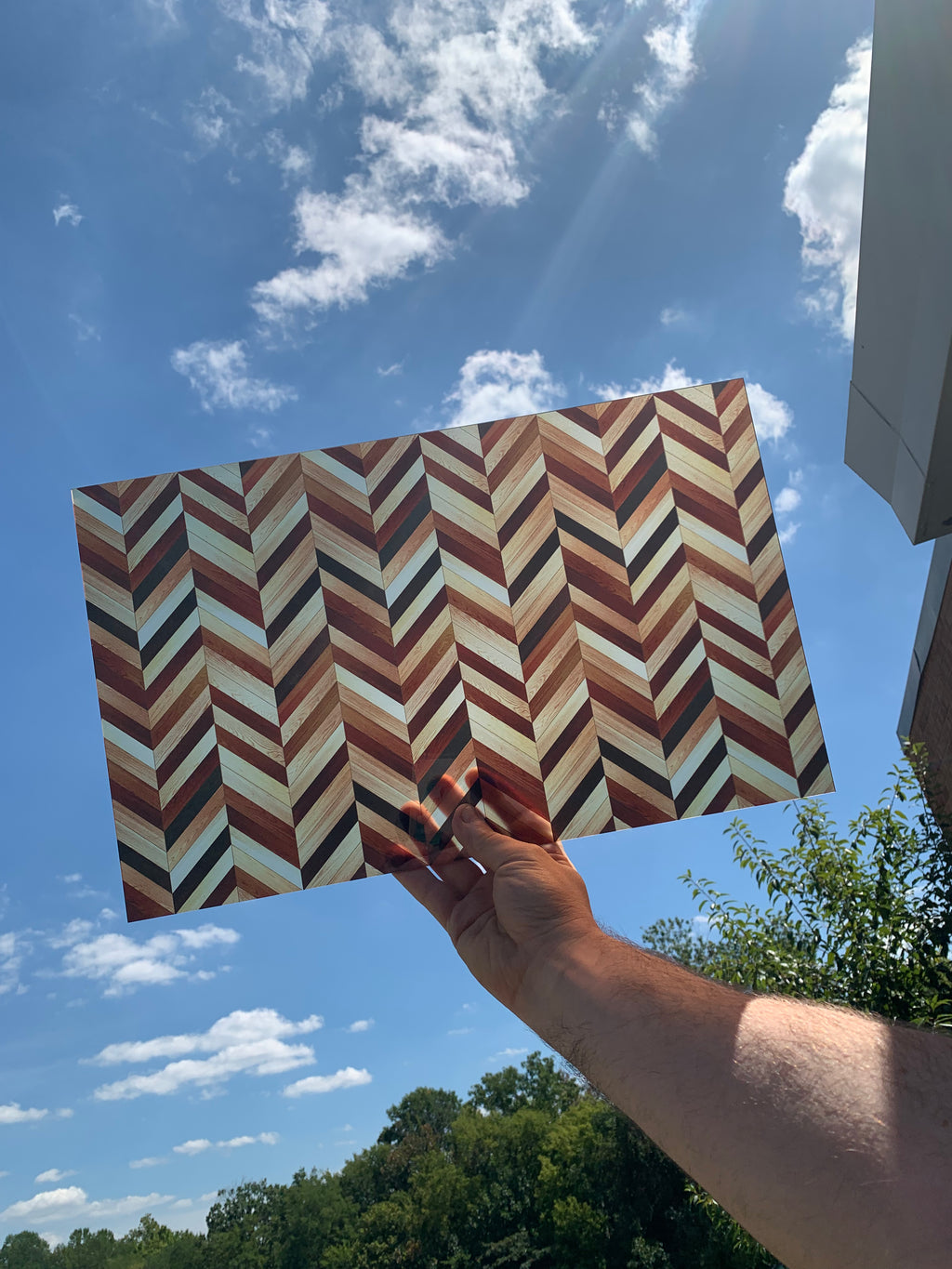 PatternPly® Transparent Natural Herringbone sheet showing the pattern