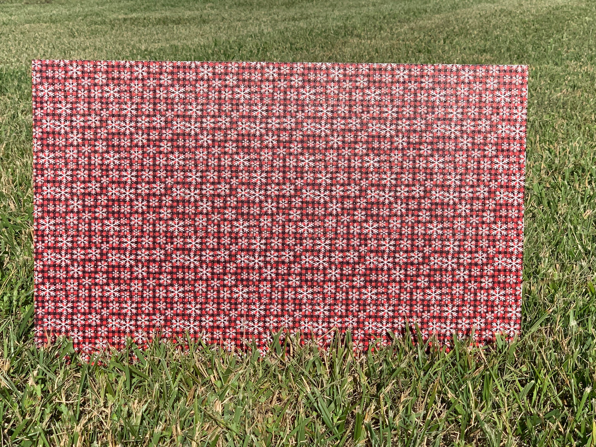 PatternPly® Full Coverage Mini Red Snowflake Buffalo Plaid sheet showing the pattern