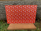 PatternPly® Full Coverage Orange and Red Hawaiian sheet showing the pattern