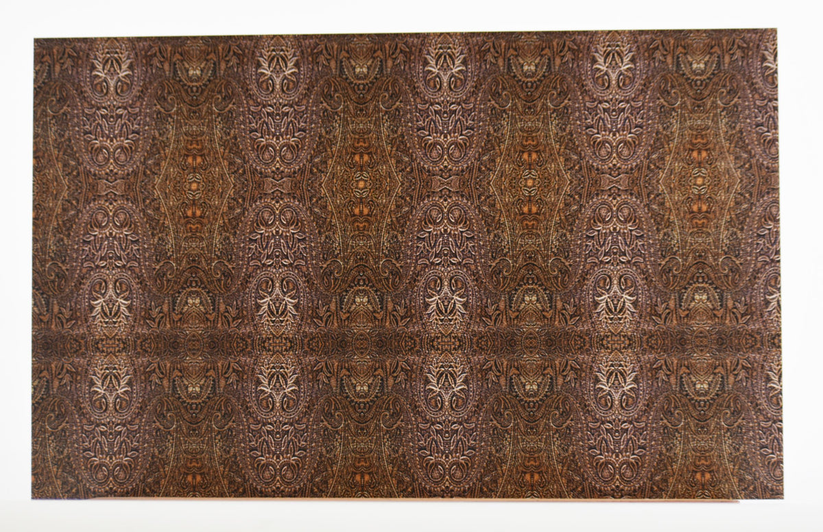PatternPly® Full Coverage Micro Brown Tooled Leather sheet showing the pattern